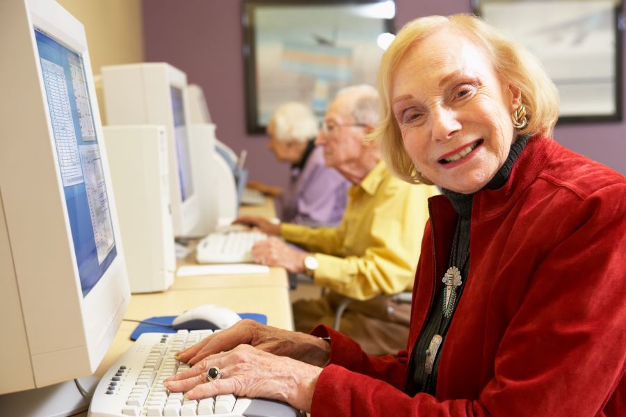 senior woman at an old computer